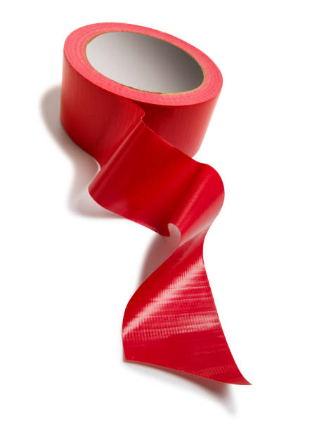 adhesive red tape isolated on white stock photo - red tape” imagens e fotografias de stock