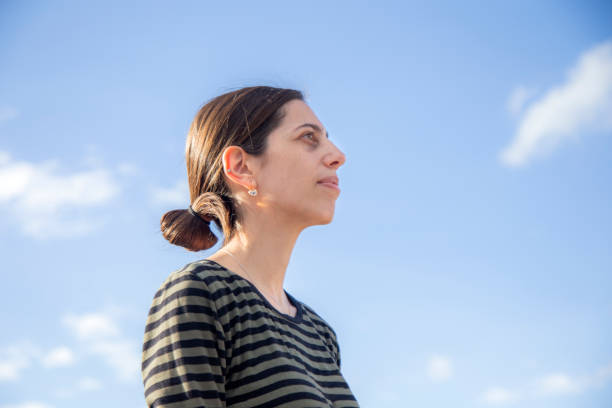 istock Woman looking at the horizon 1276705636