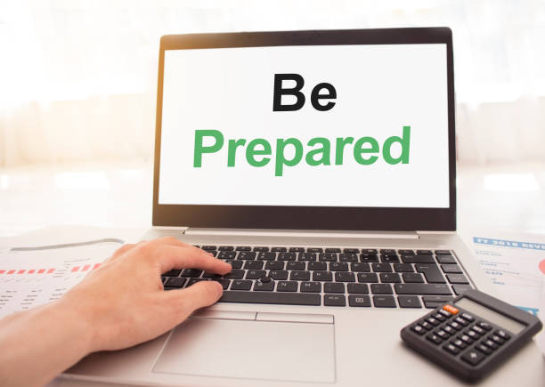 istock Man's hands typing on laptop keyboard with white background 1276705753