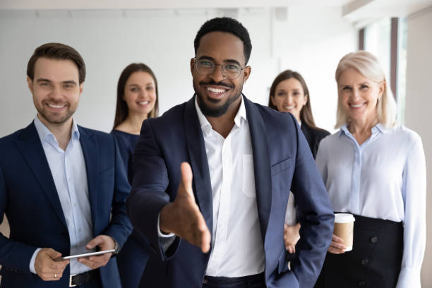 istock Portrait of multiracial team welcome work candidate 1276706805
