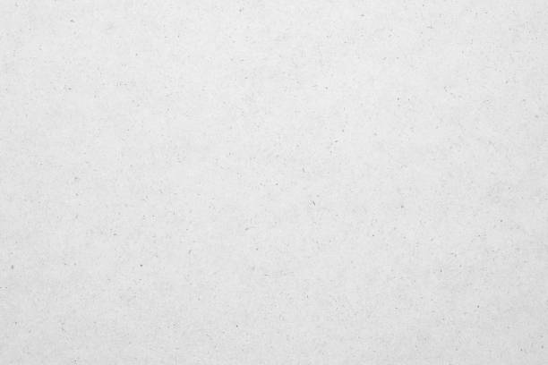 istock White recycle kraft paper cardboard surface texture background 1276707172