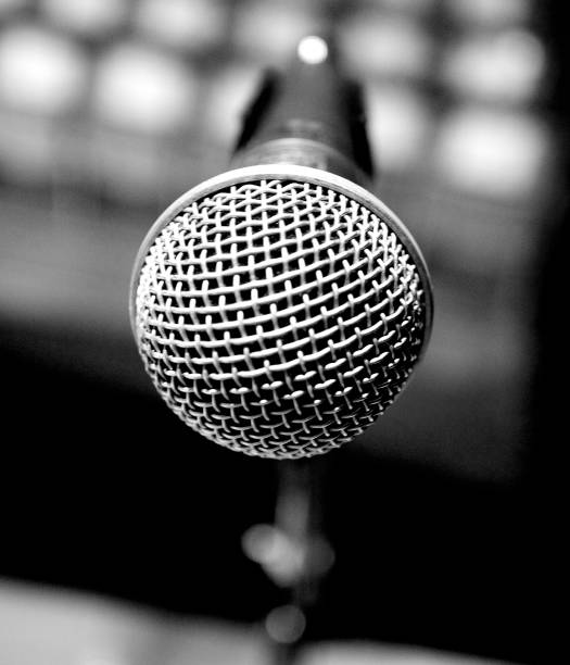 istock Intimidation- Closeup of Microphone 1276708003