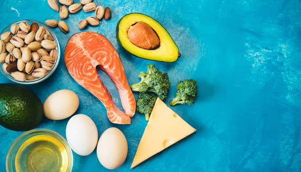 istock Keto diet, food on blue background. Selective focus 1276711921