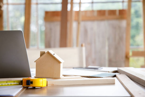 tiny wooden house on table. - tape measure home improvement measuring wood imagens e fotografias de stock