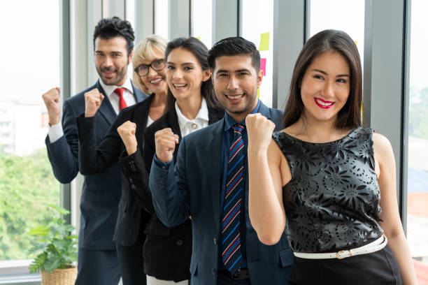 istock Successful business people standing together 1276717784