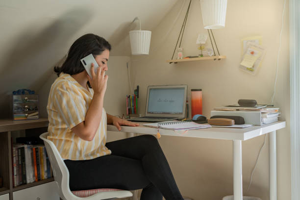 istock Latin woman working from home 1276719644
