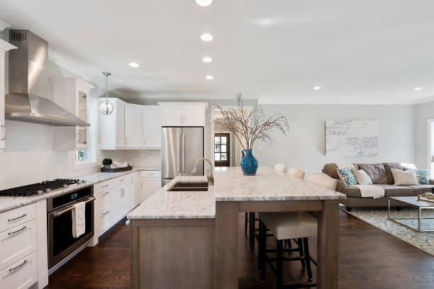 istock Double level kitchen island in new home 1276724614