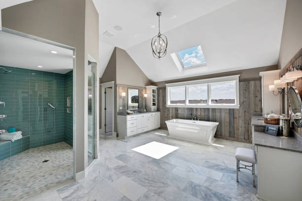 istock Spectacular walk-in shower in a spacious bathroom with skylights 1276730623