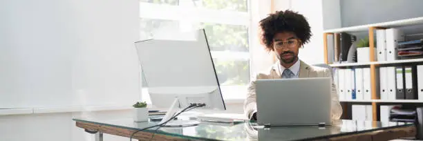 African American Business Man Using Computer In Office