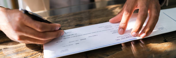 istock African Writing Money Cheque. Sign Check 1276730880