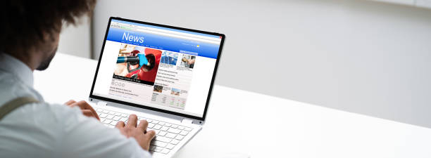 istock Man Reading News Online 1276731883