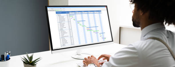 istock Close-up Of A Businessman Working On Gantt Chart Using Computer 1276731915