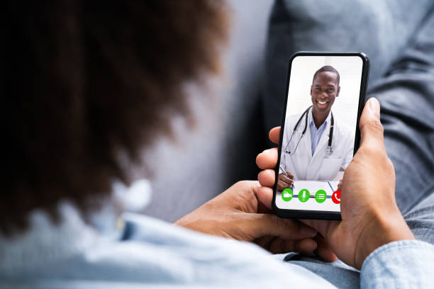 African American Video Conferencing With Doctor African American Video Conferencing With Doctor. Online Telemedicine hypertext transfer protocol photos stock pictures, royalty-free photos & images