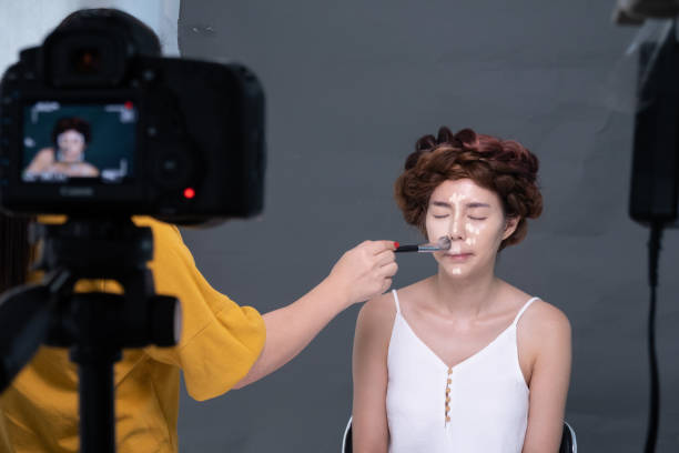 istock The makeup artist was doing the makeup for the model. 1276735331