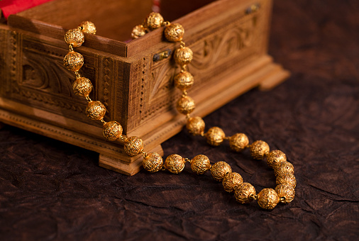 Indian Traditional Gold Necklace shot in studio light.