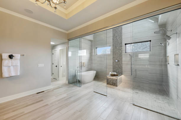 large glassed-in space with bathtub and shower in one - bathroom shower glass contemporary imagens e fotografias de stock