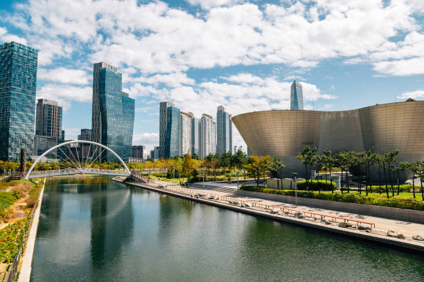 Songdo Central Park. modern city view with Tribowl and skyscrapers in Incheon, Korea Incheon, Korea - September 25, 2020 : Songdo Central Park. modern city view with Tribowl and skyscrapers songdo ibd stock pictures, royalty-free photos & images