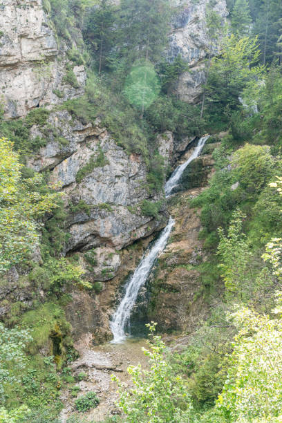 istock view on lainbach waterfall in summertime near mittenwald, bavaria, germany 1276756988