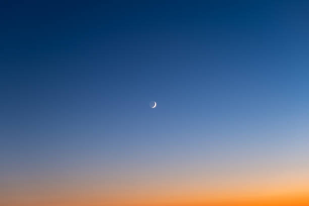 istock Sky color gradient as a background. Sky with moon during sunset. Nature composition. 1276758488