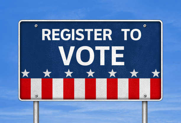 istock Register to Vote - roadsign message 1276760336