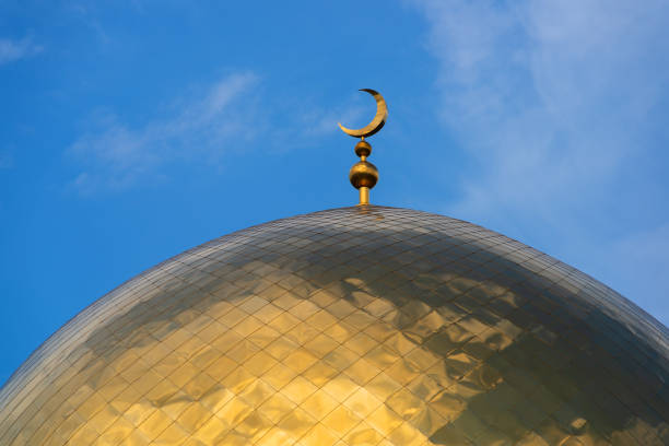 istock Golden dome of a mosque with a crescent 1276761888