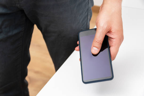 person holding up a smart phone