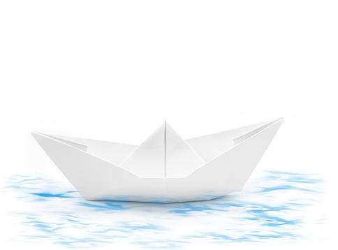 Paper boat on the water with white background