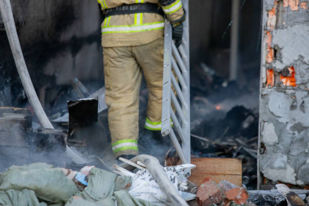 istock Russian firefighter is on call, in the process of extinguishing a fire 1276767175
