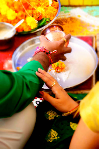 istock Indian Couple Doing Holly Kalash Pooja Close-Up 1276768582
