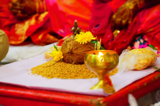 Coconut Decorate with Flower Spread Wheat Diya in Holly Pooja stock photo