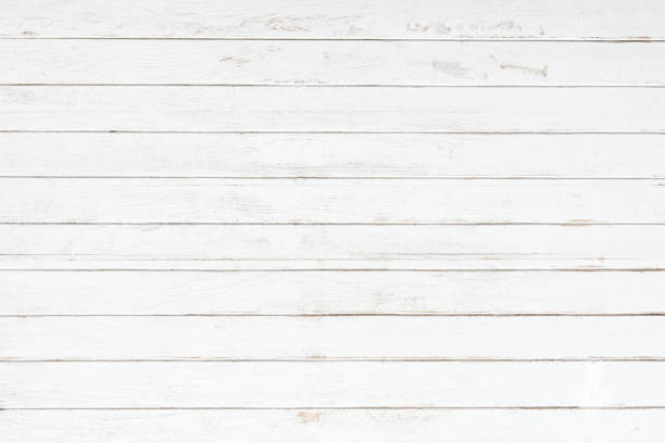istock White grey wood color texture horizontal for background. Surface light clean of table top view. Natural patterns for design art work and interior or exterior. Grunge old white wood board wall pattern. 1276772139