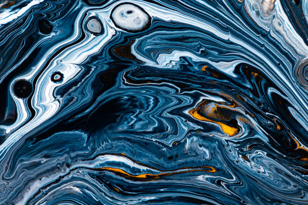 istock Fluid art texture. Backdrop with abstract iridescent paint effect. Liquid acrylic picture with beautiful mixed paints. Can be used for interior poster. Black, navy blue and golden overflowing colors. 1276772284
