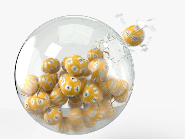 istock yellow lottery ball breaks glass. 3D illustration 1276774633