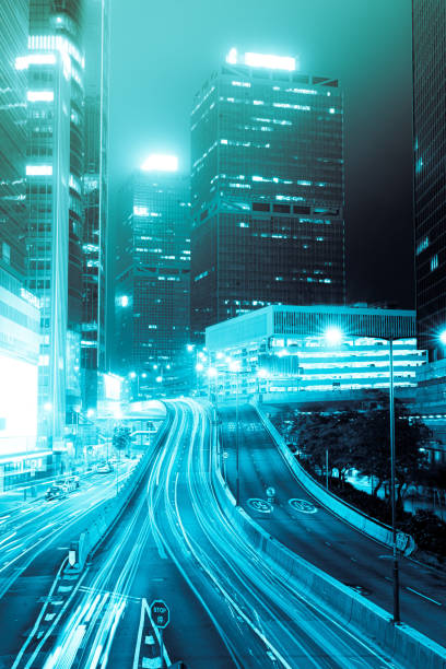 istock Traffic through hong kong at night 1276776337