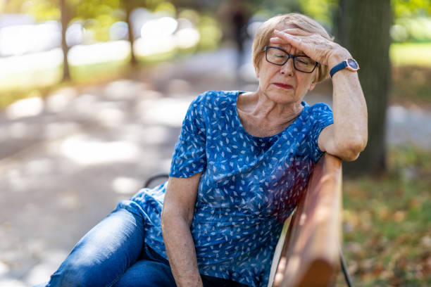 istock Senior woman suffering from a headache 1276777699