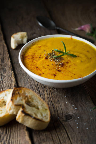 istock Hot pumpkin soup with croutons 1276777901