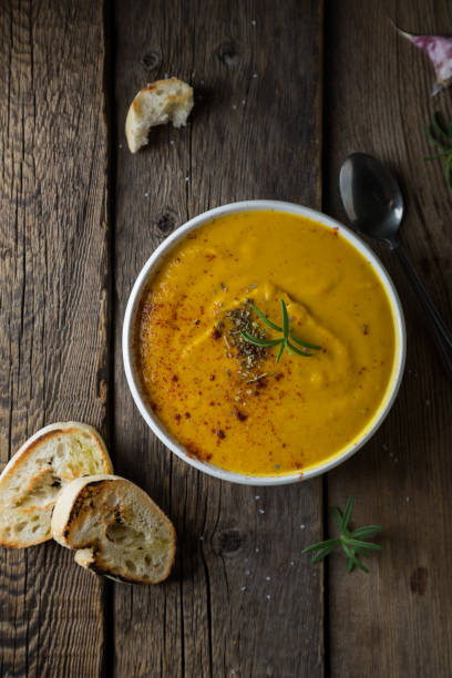 istock Hot pumpkin soup with croutons 1276777914