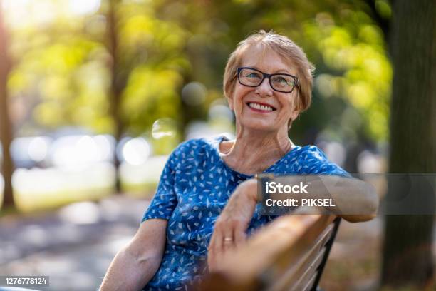 Beautiful Senior Woman Outdoors In The City Stock Photo - Download