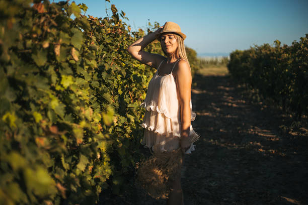 istock Woman in vineyard 1276778787
