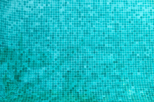 A photo from above in a swimming pool, taken in sunshine and during the day, can be used as a background image High resolution with copy space