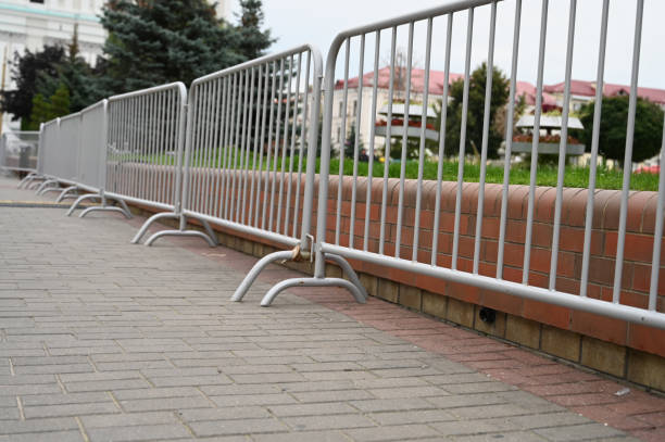 a row of metal barriers a row of metal barriers. High quality photo barricade photos stock pictures, royalty-free photos & images