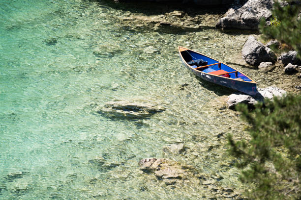 istock view on blue boat at the eibsee during summertime 1276780526