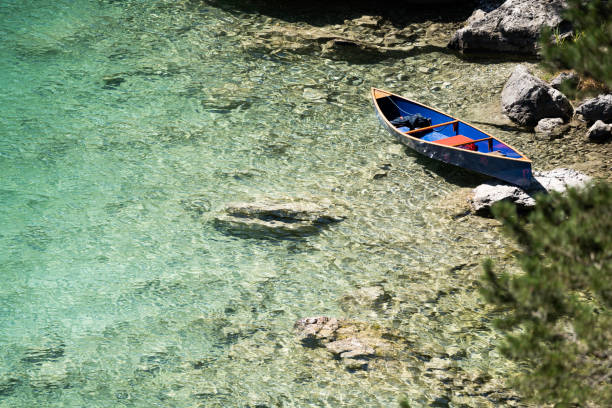 istock view on blue boat at the eibsee during summertime 1276781151