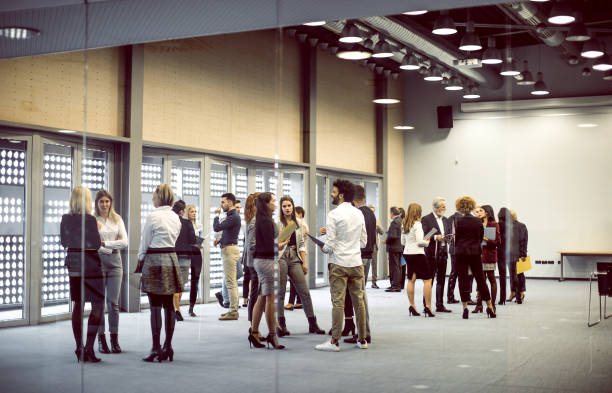 istock Business people at a conference event 1276781422
