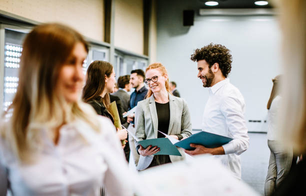istock Business people at a conference event 1276783606