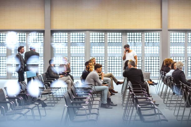 istock Business people at a conference event 1276783644