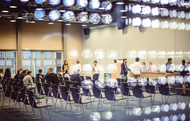 istock Business people at a conference event 1276783765