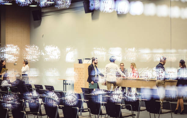 istock Business people at a conference event 1276783820