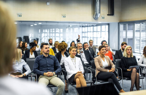 istock Business people at a conference event 1276785740