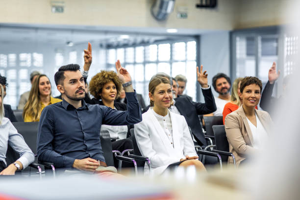 istock Business people at a conference event 1276785803